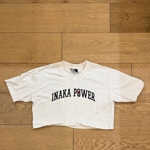 Inaka Power White Cropped Logo Tee with Red & Green Detail